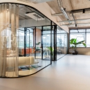 a meeting room curved glass corners partition wall of QbiQ