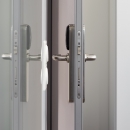 Steel door with aluminum frame and electronic lock