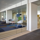 Circulaire office glass wall made of cutting loss glass panels