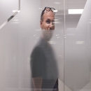 Sandblast privacy foil on glass partition