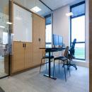 Cabinet enclosed in a single glass partition