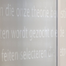 Closeup text design foil on glass wall