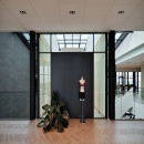 Glass wall combined with solid sections at Hunkemüller’s Distribution Center in Almere