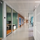 Double walled glass partition with flush door