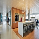 Glass offices with double glass partition an full flush door