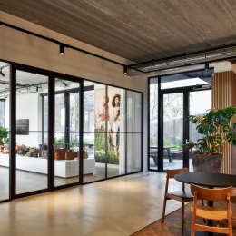 Full glass partition with double doors