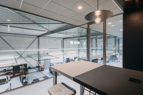 Partition with safety glass at the first floor at Wraptor in Nootdorp