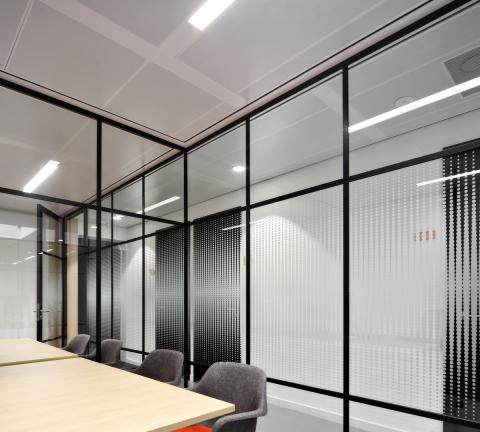Meeting rooms with an old fashion industrial look glass partition  