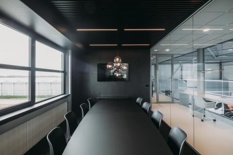 Board room with single glass partition