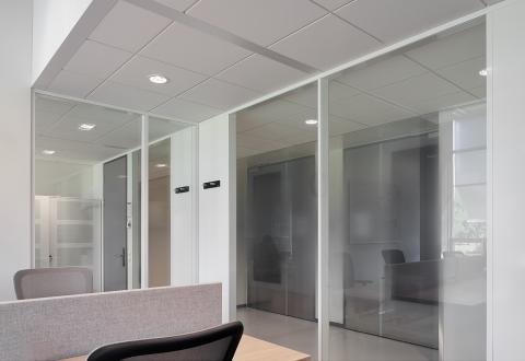 Glass and steel panels combined in a partition 
