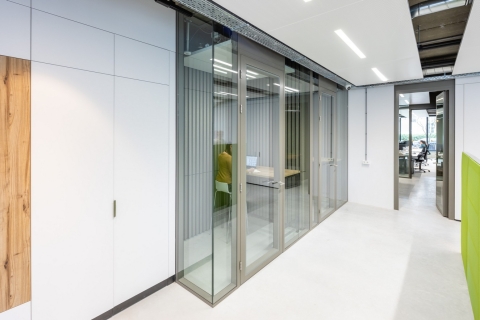 Corridor with glass partitions