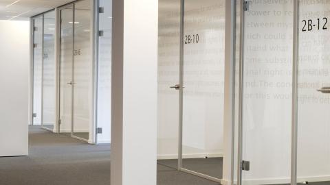 Separated offices created with glass partitions walls