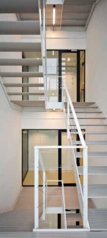 Fire resistant door in stairwell at Plus Ultra Leiden