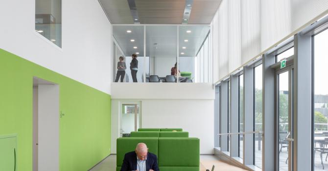 Central workspace with QbiQ Glass partition on the first floor